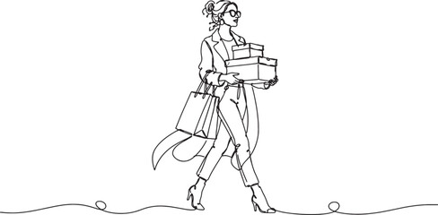 Fototapeta premium Woman carrying shopping bags and boxes walking alone