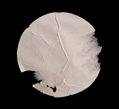 Torn, ripped paper pieces wave crack crumbled circle collage. Black and beige white grunge copy space texture poster background.