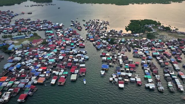 Aerial View on traditional stilt houses of Sama-Bajau people in Semporna. Sea Gypsies of Island Borneo, Sabah, Malaysia.