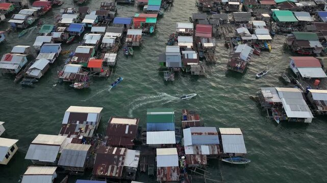 Aerial View on traditional stilt houses of Sama-Bajau people in Semporna. Sea Gypsies of Island Borneo, Sabah, Malaysia.