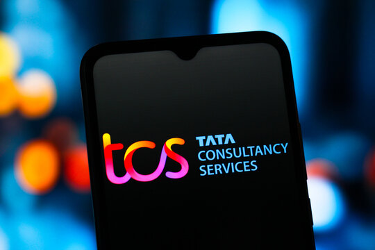 In this photo illustration, the Tata Consultancy Services (TCS) logo is seen displayed on a smartphone screen.