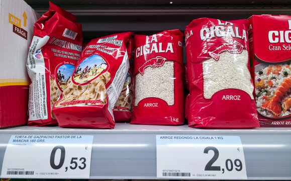 DENIA, SPAIN - Juny 18, 2026.Rice packages from La Cigala and La Mancha gazpacho tortas on a shelf in a retail store in Spain