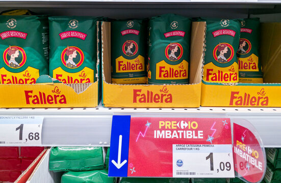 DENIA, SPAIN - Juny 18, 2026.La Fallera round rice packages on display with promotional discount in a Carrefour supermarket in Spain
