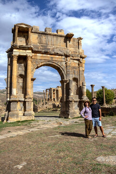 Selfie or group photo in front of the Arch of Caracalla, Dj&eacute;mila
