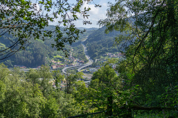 Fototapeta premium Winding mountain highway through a valley in Asturias Spain