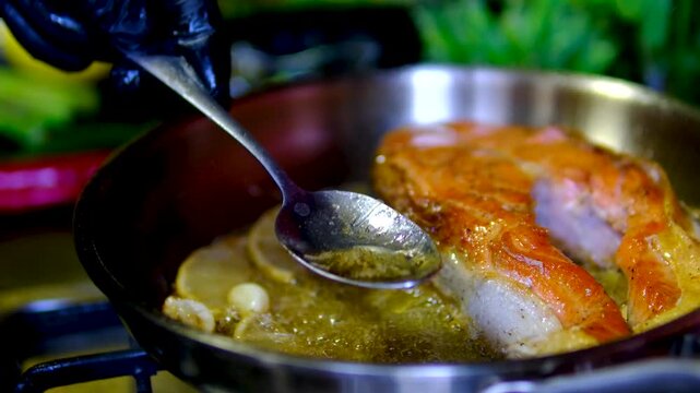 Step by step salmon recipe asparagus garlic butter cooked on stainless steel skillet in modern kitchen healthy gourmet meal preparation salmon recipe, healthy, cooking process, restaurant style meal