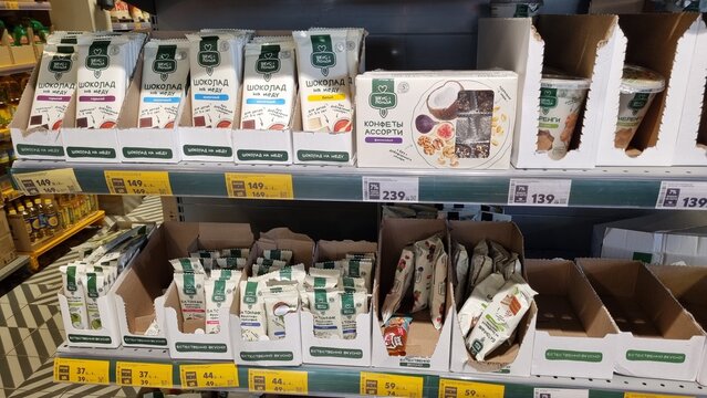 Healthy Snack Products Displayed on Supermarket Shelf in Grocery Store