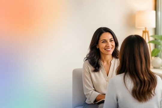 Therapist and client in counseling session with supportive consultation in a modern office