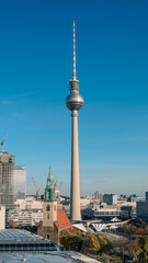 Obraz premium Berlin TV Tower and St. Mary's Church Skyline on Clear Day
