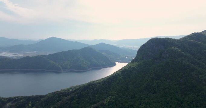 Aerial view of Boryeongho Lake and green mountains, South Korea