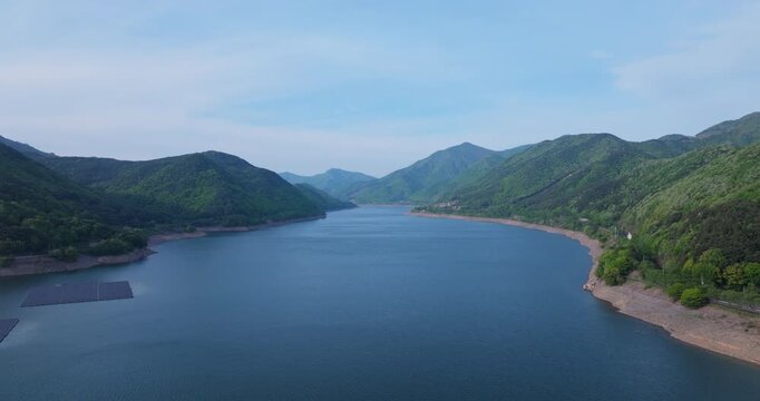 Aerial view of Boryeongho Lake and green mountains, South Korea