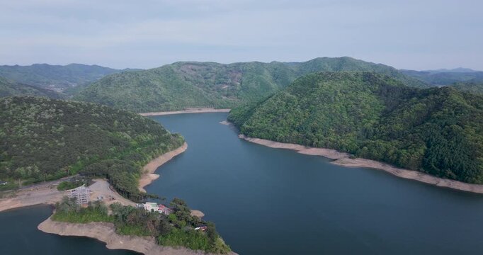 Aerial view of Boryeongho Lake and green mountains, South Korea