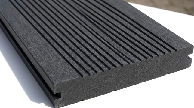 Close-up of a Durable Gray Composite Decking Board with Grooves for Outdoor Flooring