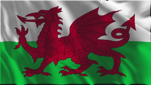 Welsh flag waving slowly in the foreground