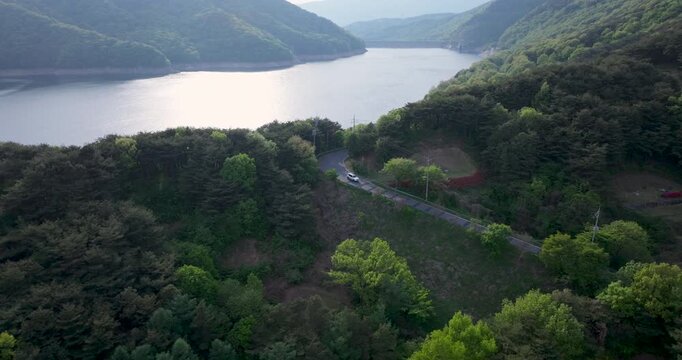 Aerial view of Boryeongho Lake and green mountains, South Korea