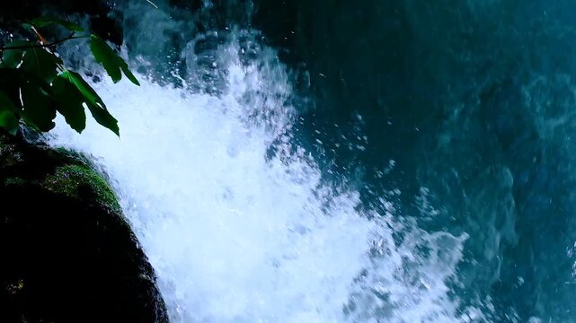 Fast Flowing Waterfall with Intense Water Power. Powerful Waterfall with High Water Flow. Spectacular Waterfall with Strong Current.