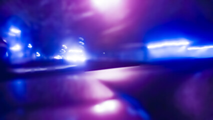 Abstract background with vibrant blue and purple neon light flares, long exposure motion blur effect, glowing colorful futuristic streaks for modern digital designs and wallpaper.