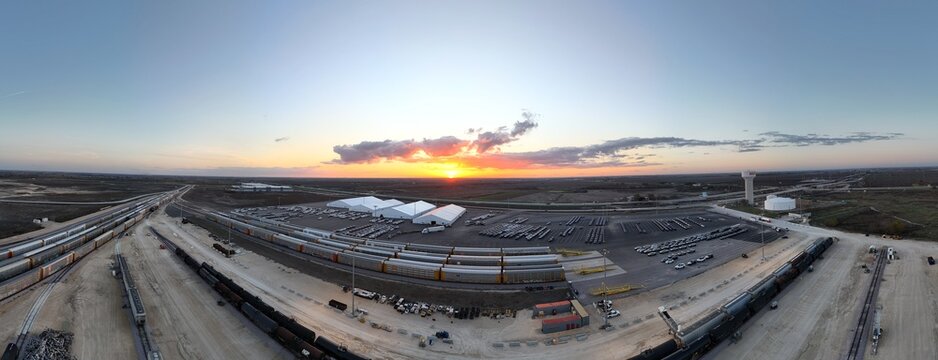 Sunset at industrial railyard