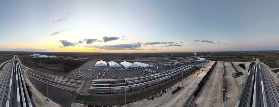 Sunset at industrial railyard