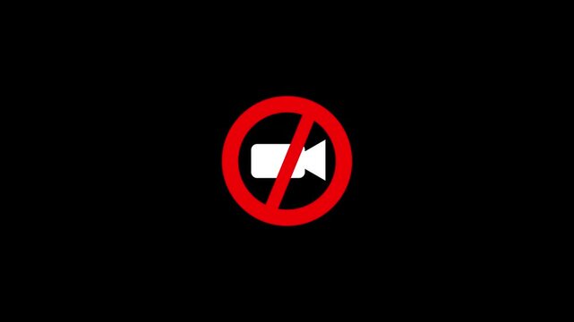 Red Prohibited sign on Camera icon representing No video or Photography. red color circle and white color camera on black color background .
