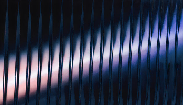 Dark ribbed glass background with gradient light streaks
