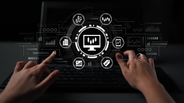 Hands typing on a keyboard with financial graphs and data analytics overlay on a computer screen in a modern workspace setting. Entropy.