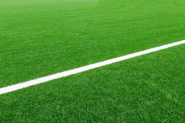 Obraz premium Fresh green turf stretches wide, vibrant and crisp.