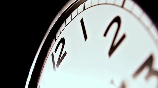 Analog Clock Face with Moving Hands Showing Passage of Time