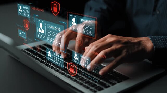 Hands Typing on Laptop with Cybersecurity Interface Displaying User Profiles and Protection Symbols in Digital Environment. Entropy.
