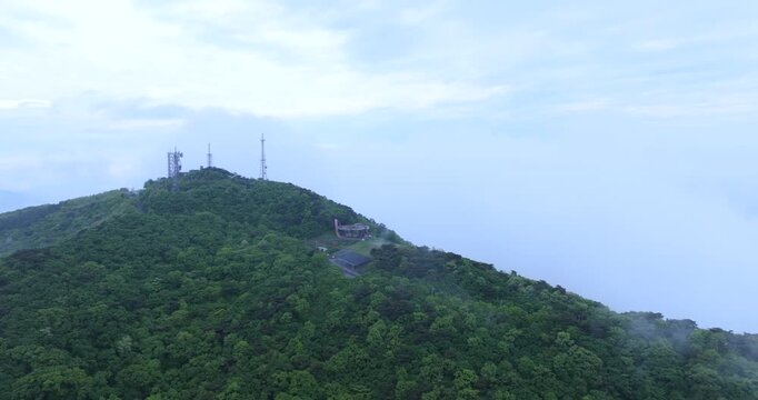 seongjusan, boryeong, south korea, aerial view, drone shot, hyperlapse, timelapse, mountain fog, mist, misty morning, cloudy sky, fast motion, atmospheric, majestic nature, serene landscape, pine tree
