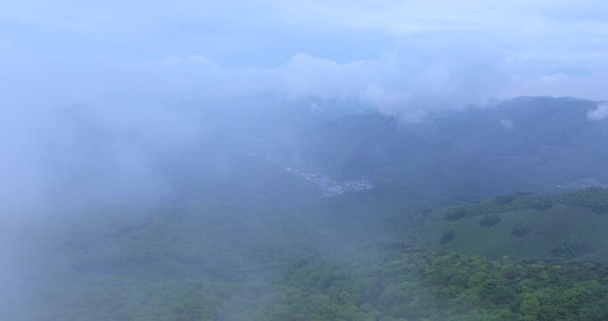 seongjusan, boryeong, south korea, aerial view, drone shot, hyperlapse, timelapse, mountain fog, mist, misty morning, cloudy sky, fast motion, atmospheric, majestic nature, serene landscape, pine tree