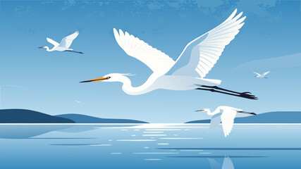 Fototapeta premium Stylized illustration of white egrets or herons flying over a calm blue lake against a clear sky with rolling hills in the background.
