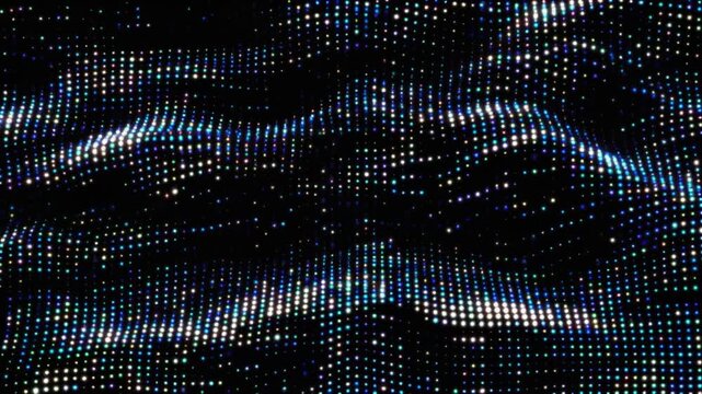 A mesmerizing display of colorful lights creates a vibrant pattern on a dark background.