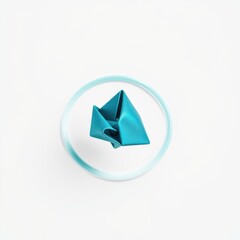 Fototapeta premium Blue paper fortune teller sits inside light blue circular frame. Minimalist studio shot, clean background, simple composition.