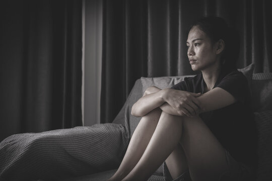 A woman with a sorrowful expression symbolizes depression, loneliness, fear, and the emotional consequences of gender based violence.