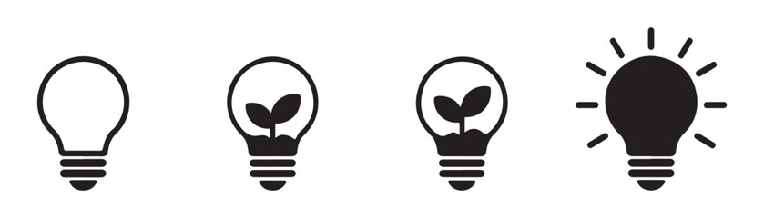 Set of light bulb icons with plant growing inside on transparent background. © Labib