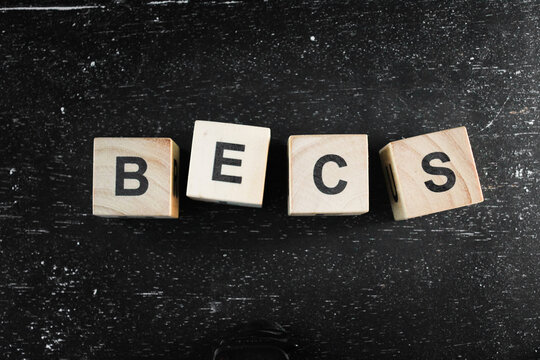 Wooden Block words on black background.