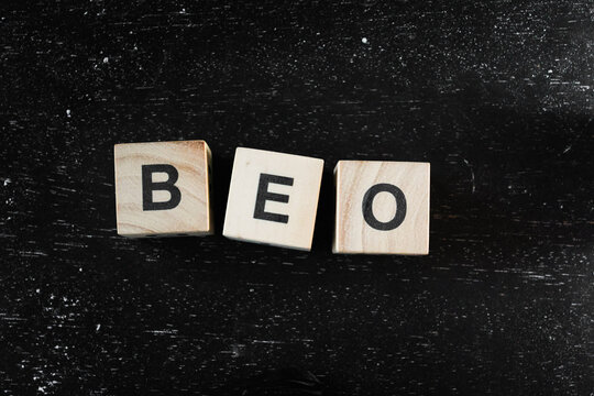 Wooden Block words on black background.