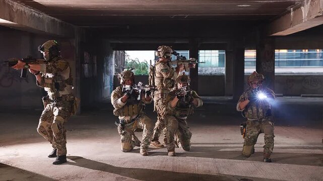 Operators Advancing with Rifles in Smoke Filled AO
