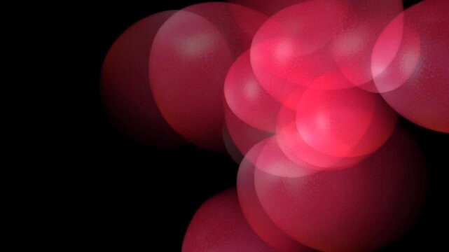 A cluster of red translucent spheres on a black background with lighting effects