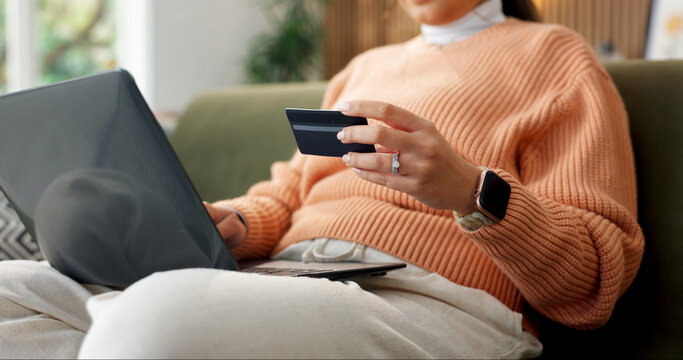 Hand, credit card and laptop in home for online shopping, subscription payment or transaction. Person, webshop and debit details for ecommerce, internet banking and pc for fintech, purchase or buying