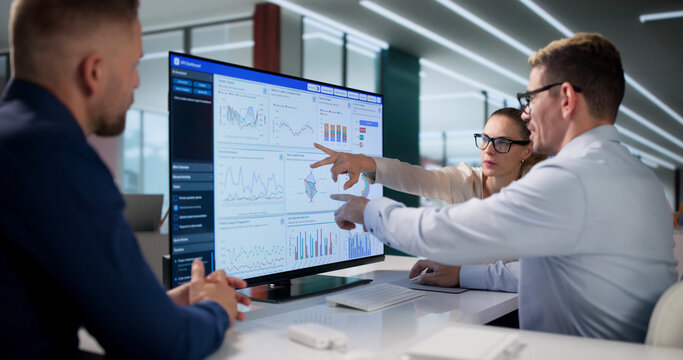 Diverse Team Of Financial Analysts Is Reviewing Performance Data