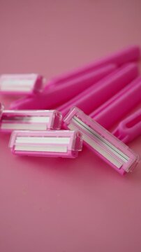 Fun pink razors on a pink background for everyday use