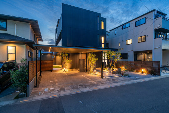 Modern Japanese house exterior with landscaped garden