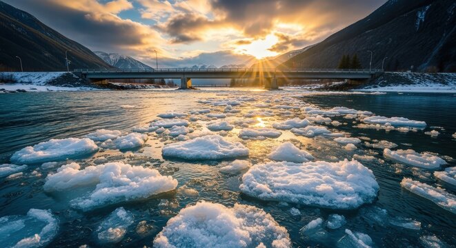 Frozen river with ice floes at sunset