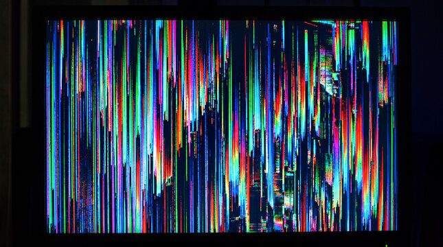 Creative glitch art effect showing a digital screen breaking down into vertical vibrant color strips