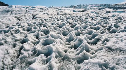 Fototapeta premium Intricate Natural Patterns Formed By Maze Of Small Sun Cups On Frozen Glacier Surface Ice