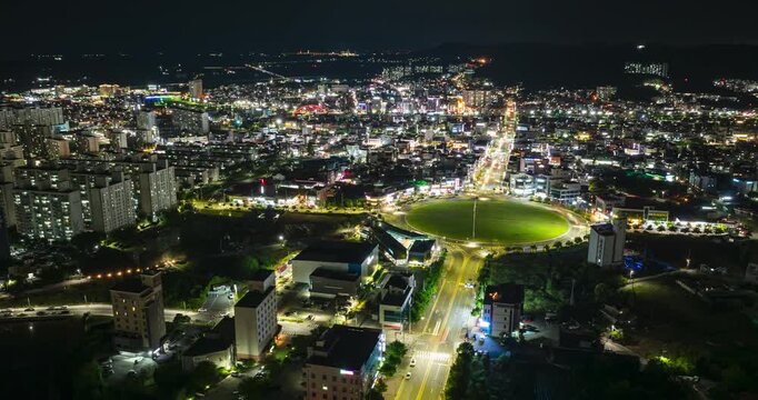 Aerial hyperlapse of Boryeong city roundabout from sunset to night, South Korea