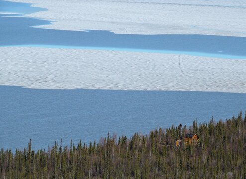 Isolated cabin on McKenzie river bank, Northwest Territories Canada 