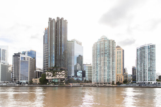 Mix of high-rise residential and commercial towers along the riverbank